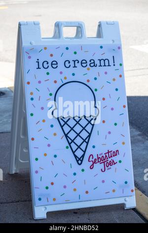 A sign out front of the Juneberry Cafe in Taylors Falls, MN advertising Sebastian Joe's Ice Cream.(Established in 1984) Stock Photo
