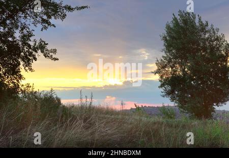 The rays of the sun break through the clouds. Khakassia, Siberia, Russiaм Stock Photo