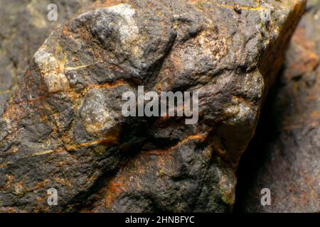 Rock textures and mineral layers, sediments, colors of stones. Mineral forms and colors. Rock or stone pattern close-up. Stock Photo