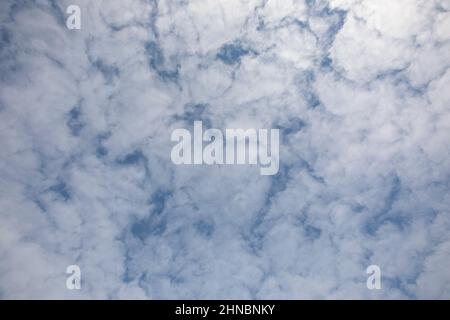 blue sky background with clouds. blue fluffy cloudy skies texture Stock Photo