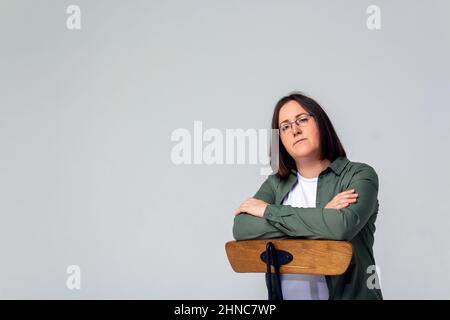 Small business owner woman on grey background.  Stock Photo