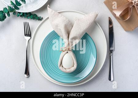 Serving the Easter table. Top view. The concept of a Happy Easter. Stock Photo