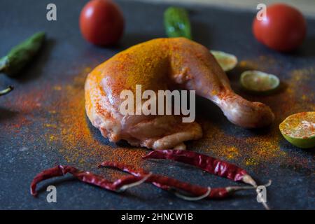 Chicken meat marinated in Indian spices. Close up. Stock Photo