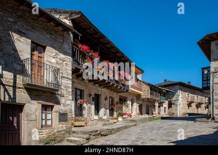 Puebla de Sanabria, Zamora, Spain;July 2021: Old village with picturesque stone buildings and flowers in Puebla de Sanabria, Zamora province, Castilla Stock Photo