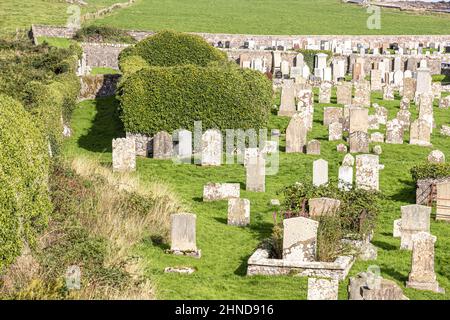 The roofless, ivy-covered chapel of St Columba in Keil Cemetery near Southend on the Kintyre Peninsula, Argyll & Bute, Scotland UK Stock Photo