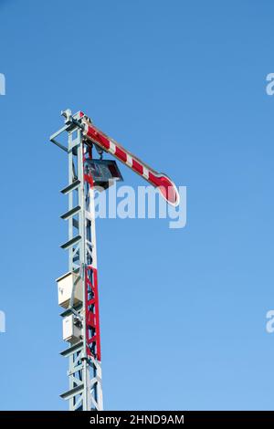 The traffic signal pole in the stop status of the railway traffic system in the local station, front view with the copy space. Stock Photo