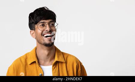 Handsome young indian man looking at copy space Stock Photo