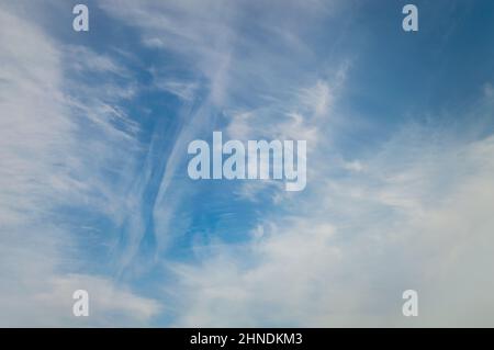 Different shapes in the sky - lines, patches, curves, disks, holes, circles Stock Photo