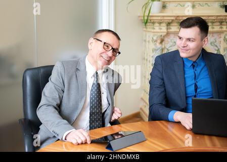 Two business men in office Stock Photo