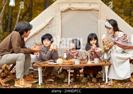 Japanese Family Eating Camping Rice Stock Photo