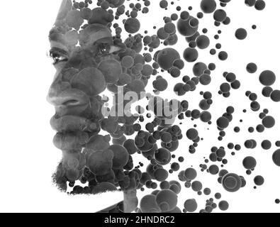 A portrait of an African American man combined with floating 3D spheres. Stock Photo