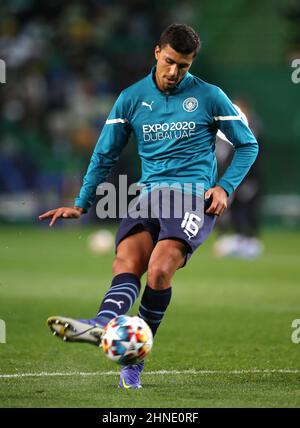 Manchester City's Rodri warming up prior to kick-off in the UEFA Champions League Round of 16 match at the Jose Alvalade Stadium, Lisbon. Picture date: Tuesday February 15, 2022. See PA story SOCCER Man City. Photo credit should read: Isabel Infantes/PA Wire. RESTRICTIONS: Use subject to restrictions. Editorial use only, no commercial use without prior consent from rights holder. Stock Photo