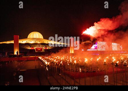 Bangkok, Thailand. 16th Feb, 2022. Fires are burned during Makha Bucha Day at Wat Phra Dammakaya in Bangkok, Thailand, Wednesday, February 16, 2022. 1000 monks participate in the ceremony and light tens of thousands of candles. (Credit Image: © Andre Malerba/ZUMA Press Wire) Stock Photo