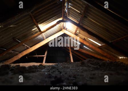 Dark old attic in the abandoned house. Stock Photo