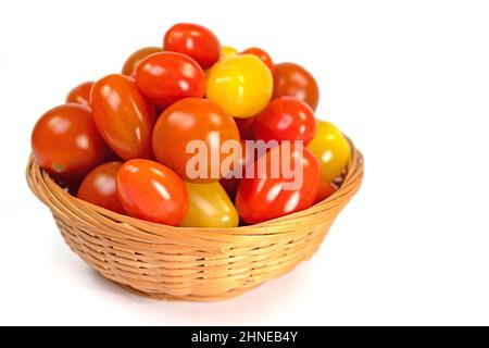 Various mini tomatoes against a white background Stock Photo