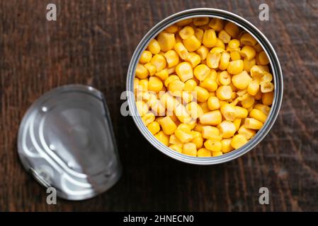 Overhead view of an opened can with sweet corn.