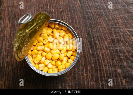 Overhead view of an opened can with sweet corn.