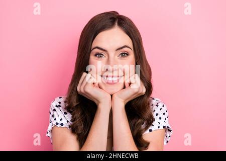 Close-up photo of cute pretty winsome lady relaxing watching you enjoy moment isolated on pink color background Stock Photo