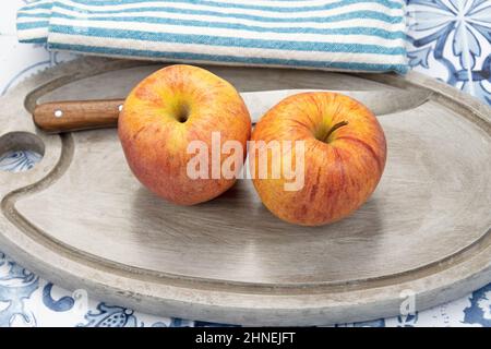 apples on a gray wooden board Stock Photo