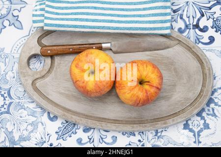apples on a gray wooden board Stock Photo