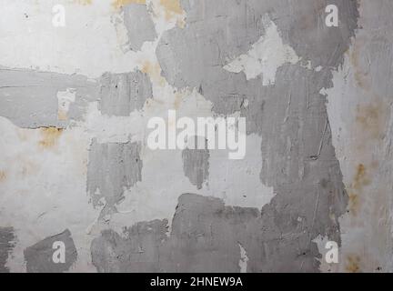 Background texture, wall during renovation, putty and painting and whitewashing. Stock Photo