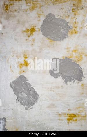 Background texture, wall during renovation, putty and painting and whitewashing. Stock Photo