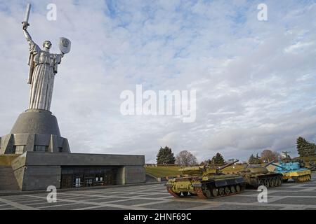 Kyiv, Ukraine - November 22 2021: Russia and Ukraine Tanks in front of Motheland Monument , Russo-Ukrainian crisis Stock Photo