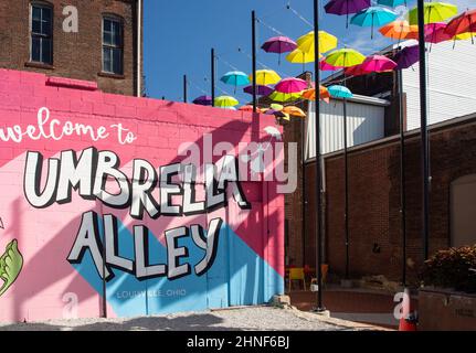 Umbrella Alley. A colorful artistic display of umbrellas hanging. Louisville, Ohio, USA. Stock Photo