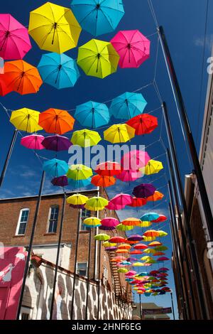 Umbrella Alley. A colorful artistic display of umbrellas hanging. Louisville, Ohio, USA. Stock Photo