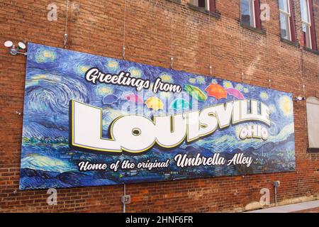 Umbrella Alley. A colorful artistic display of umbrellas hanging. Louisville, Ohio, USA. Stock Photo