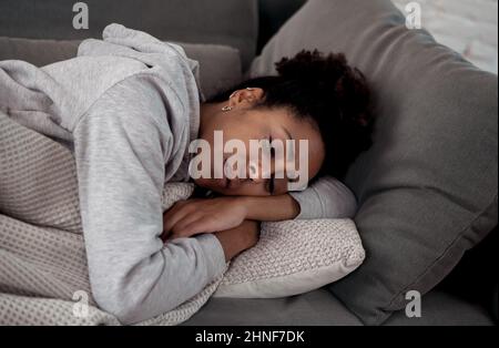 Young devastated depressed African American woman crying feeling sad, hurt suffering depression sadness and emotional pain. Mental health in young Stock Photo