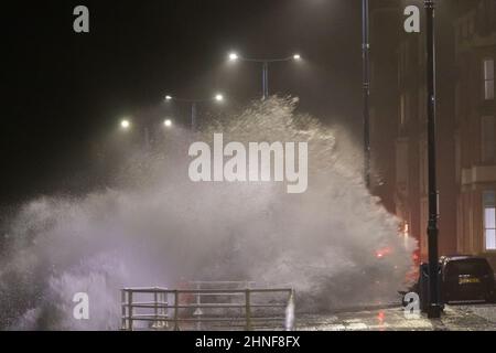 Aberystwyth, Ceredigion, Wales, UK. 16th February 2022  UK Weather: A windy night in Aberystwyth, as storm Dudley combines with a high tide, bringing rough seas crashing against the promenade. © Ian Jones/Alamy Live News Stock Photo