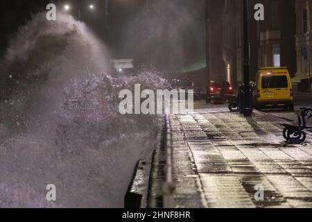 Aberystwyth, Ceredigion, Wales, UK. 16th February 2022  UK Weather: A windy night in Aberystwyth, as storm Dudley combines with a high tide, bringing rough seas crashing against the promenade. © Ian Jones/Alamy Live News Stock Photo