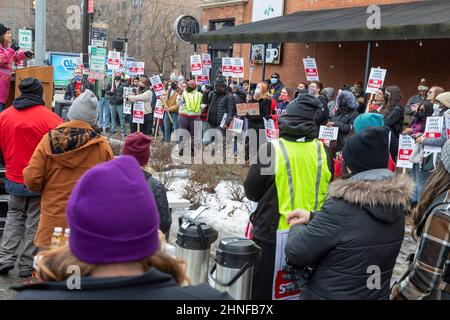 Detroit, Michigan, USA. 16th Feb, 2022. Workers at Great Lakes Coffee and their supporters rally outside the chain's midtown Detroit location in support of a union organizing campaign. Workers at the store were locked out of their jobs in January. They had asked for a series of covid safety measures after employees became sick with the virus. United Auto Workers Vice President Cindy Estrada (far left) speaks to the crowd. Credit: Jim West/Alamy Live News Stock Photo