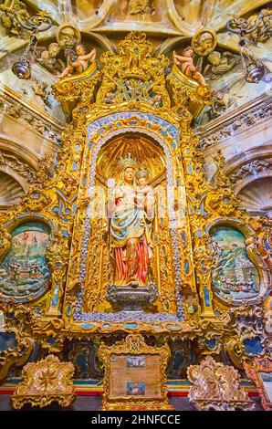 SEVILLE, SPAIN - SEPT 29, 2019: The ornate Rococo Capilla de la Estrella of Seville Cathedral with sculpture of Nuestra Senora de la Estrella, on Sept Stock Photo