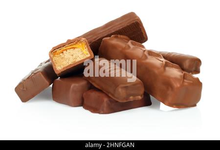 Heap of chocolate bars on white background close-up Stock Photo