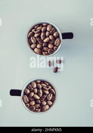Coffee Beans Falling against White Background Stock Photo - Alamy
