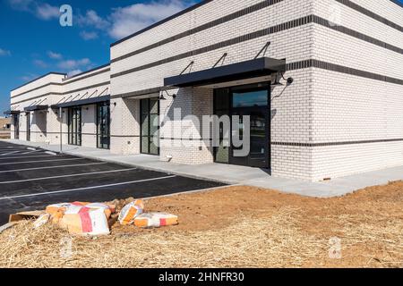 Horizontal shot of a new retail shopping center. Stock Photo