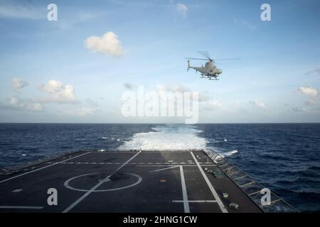 220214-N-LI768-1141  PHILIPPINE SEA (Feb. 14, 2022) – An MQ-8B Fire Scout takes off from the flight deck of the Independence-variant littoral combat ship USS Tulsa (LCS 16). Tulsa, part of Destroyer Squadron (DESRON) 7, is on a rotational deployment, operating in the U.S. 7th Fleet area of operations to enhance interoperability with partners and serve as a ready-response force in support of a free and open Indo-Pacific region. (U.S. Navy photo by Mass Communication Specialist 1st Class Devin M. Langer) Stock Photo