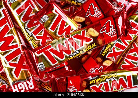 May 4, 2021. New York. Twix cookies coated with milk chocolate isolated on a white background. Stock Photo