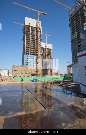 Tall, modern, glass office towers under construciton. At the downtown Tashkent City urban business development area of Tashkent, Uzbekistan. Stock Photo
