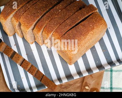 sliced organic bread loaf isolated from above on studio no people Stock Photo
