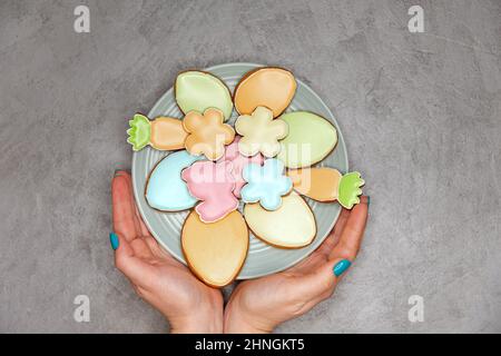 Homemade easter cookies in the shape of a funny rabbit on plate. Stock Photo