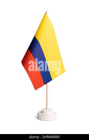 Small table flag of Colombia isolated on white background Stock Photo
