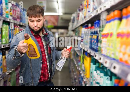 Adult young man making purchases in store Stock Photo