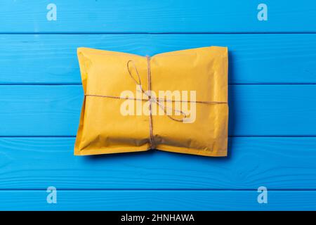 Lot of yellow paper postal envelopes. Top view. Stock Photo
