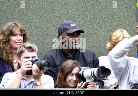 Richard Williams watches his daughters Serena and Venus play against Martina Navratilova and Mariaan de Swardt  at Wimbledon Tennis 5th July 2000 Stock Photo