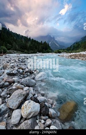 The torrent flows into the Canali Valley. Canali is considered one of the most beautiful alpine valleys in the Dolomites. Tonadico, Trentino, Italy. Stock Photo