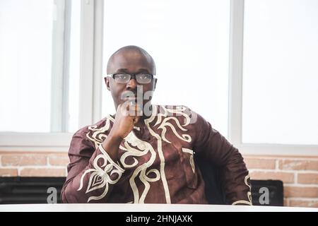 Portrait of an African American in national clothes. Black man posing in folk ethnic costume Stock Photo