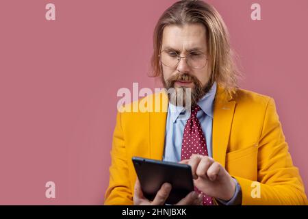 Man using tablet in studio Stock Photo